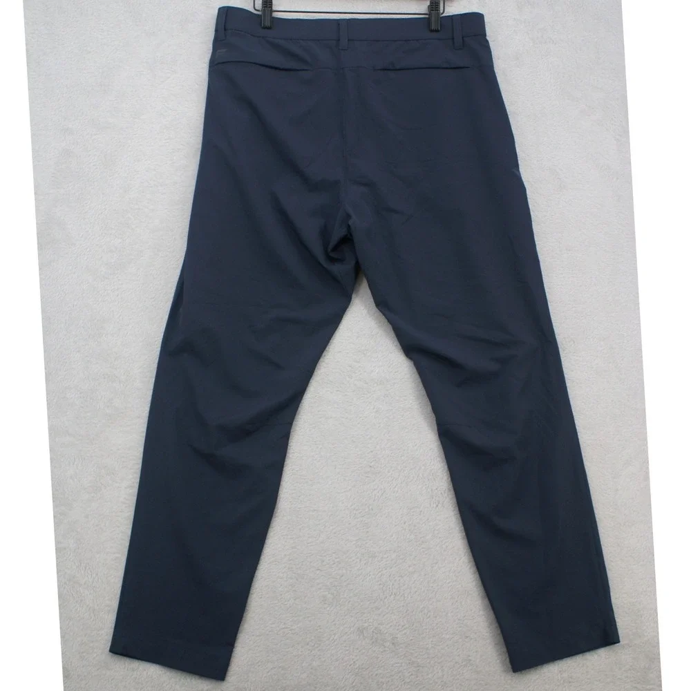 Fabletics The Only Pants 24-7 34x32 Navy Blue Stretch Golf Performance PT2253840